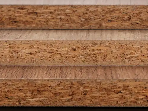 How does melamine particle board handle moisture?